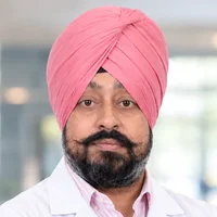 Dr. Rubinder Singh, BDS, MPH, FICOI (USA), founder, chief dental surgeon and implantologist at World Dental Care Centre, Amritsar